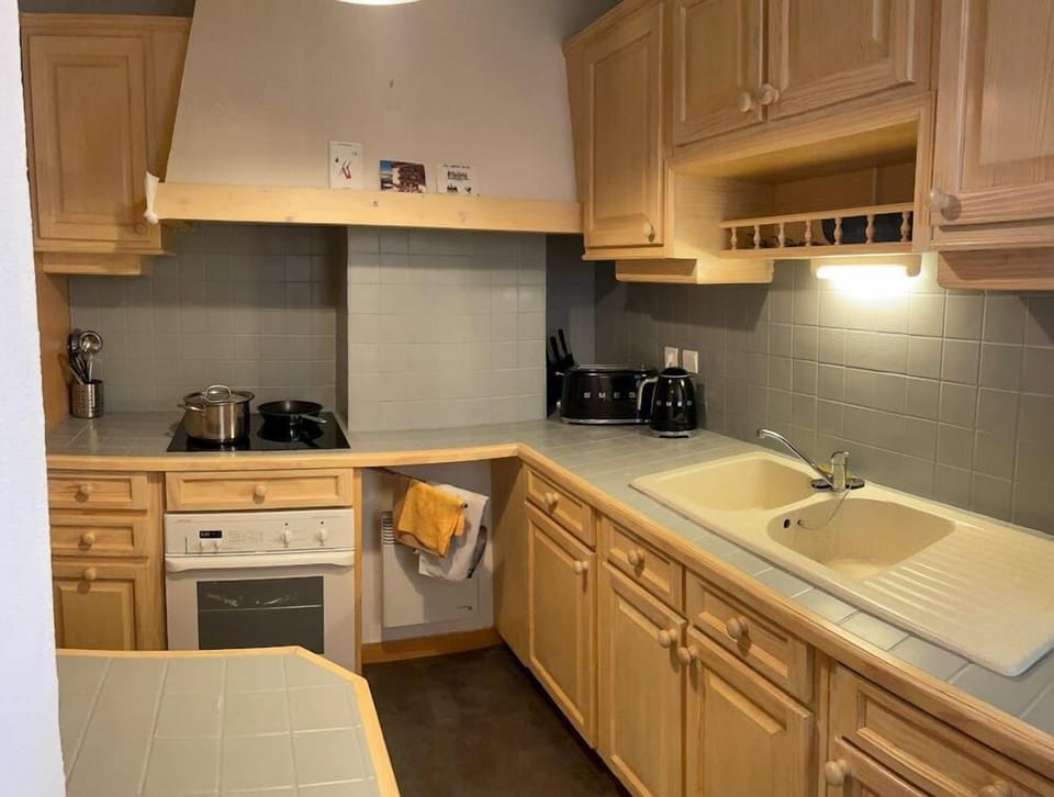 Well equipped kitchen opened to the dining area