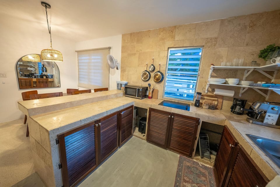 Fully equipped kitchen with spacious counters.
