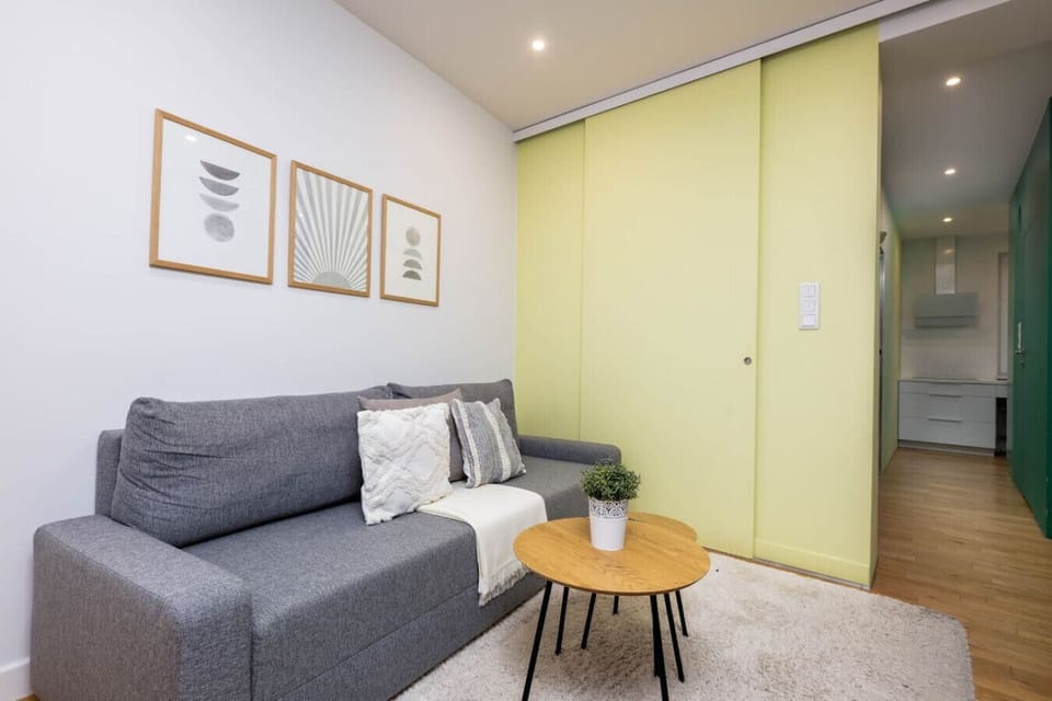 Living Room with Full Sofa Bed, Smart TV and Dining table for 4 persons | Book Now with RENTUJEMY.COM