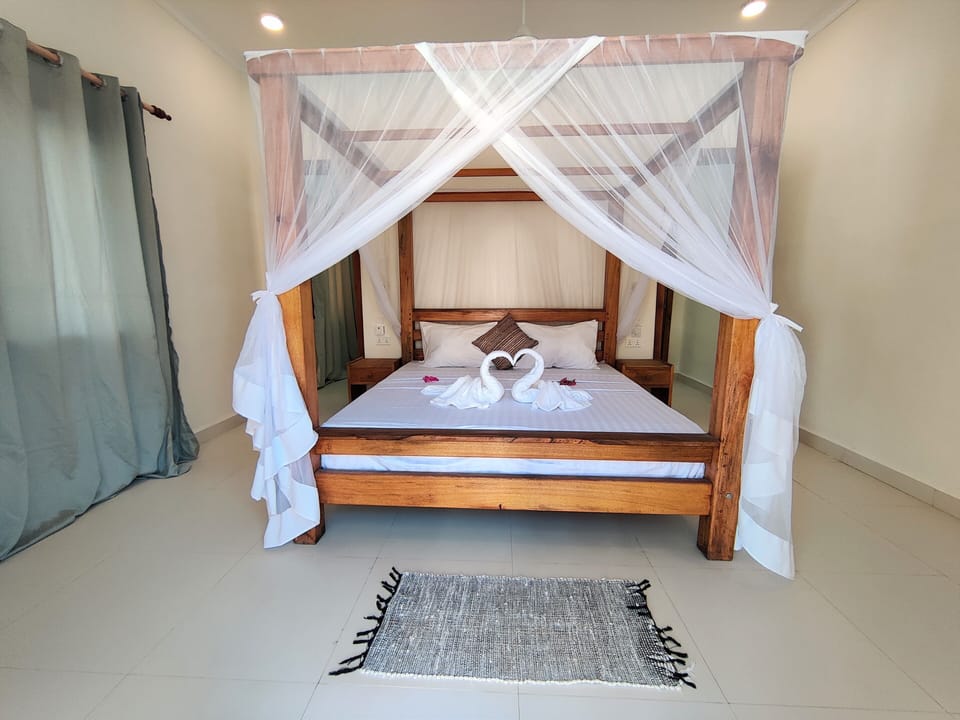 Economy Double Room, Patio, Pool View | In-room safe