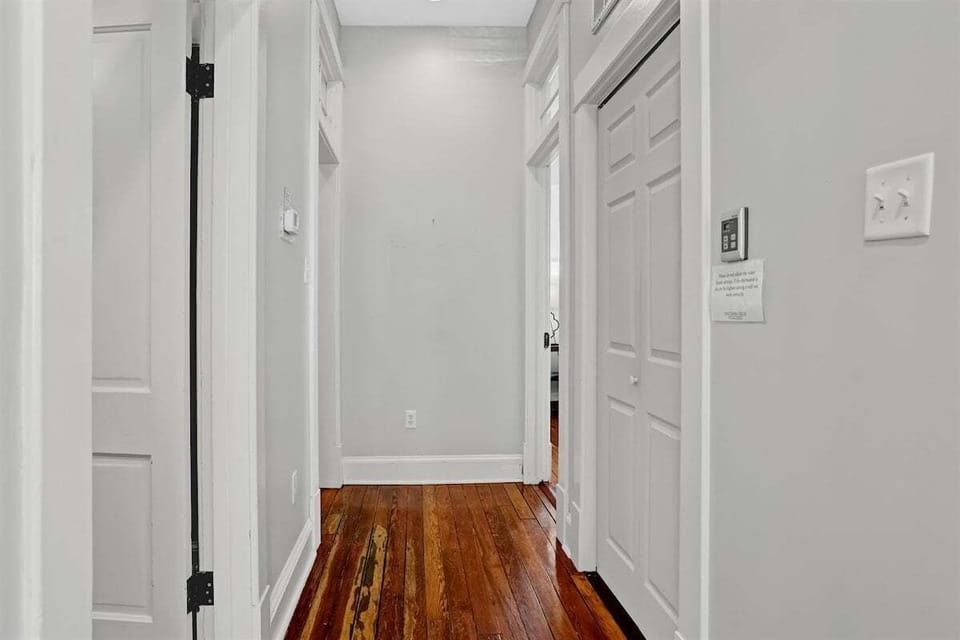 A central hallway smoothly connects all rooms for easy flow throughout the home.