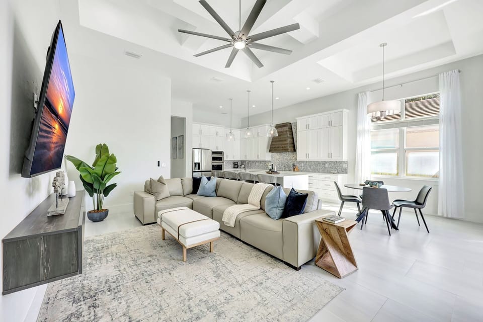 Open-concept layout designed for connection — lounge, dine, and make memories all in one beautiful space
