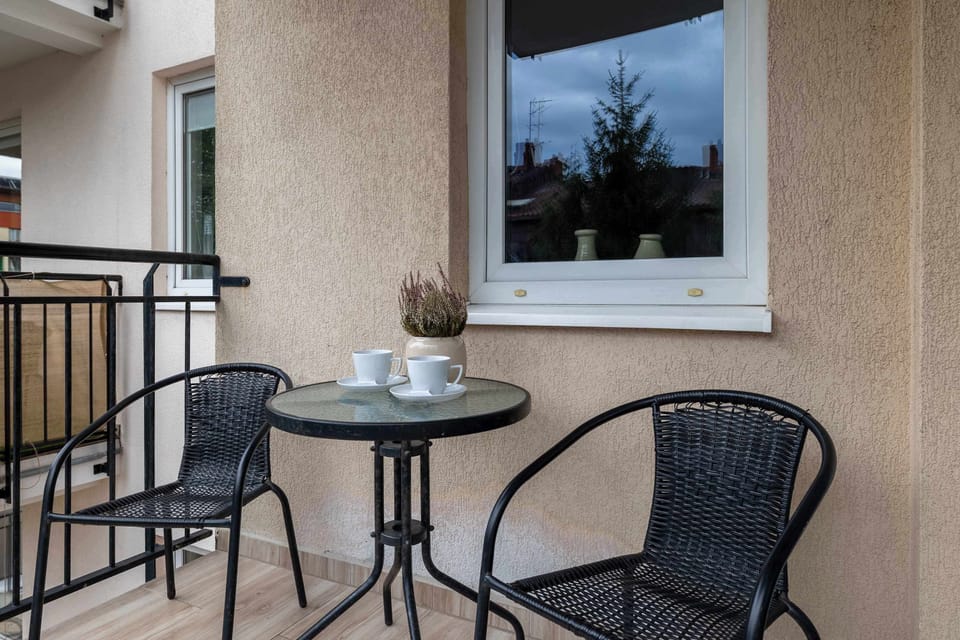 The balcony provides a perfect spot for enjoying the fresh air.