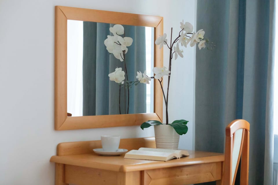 The bedroom's modern design ensures a comfortable stay.