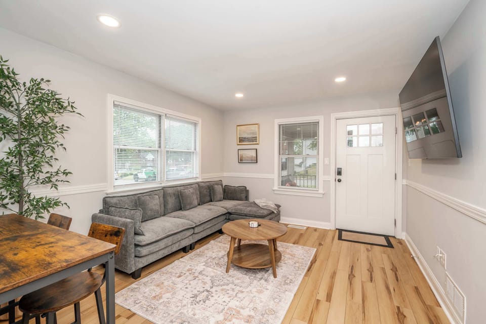 Curl up in the airy living room & stream your favorites on the smart TV​