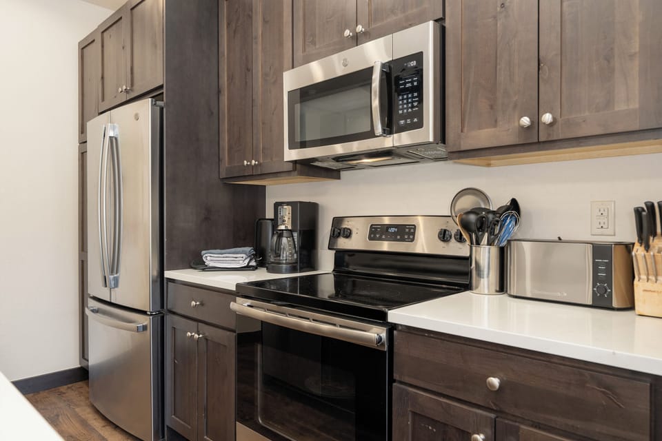 Kitchen - Modern kitchen with stainless steel appliances