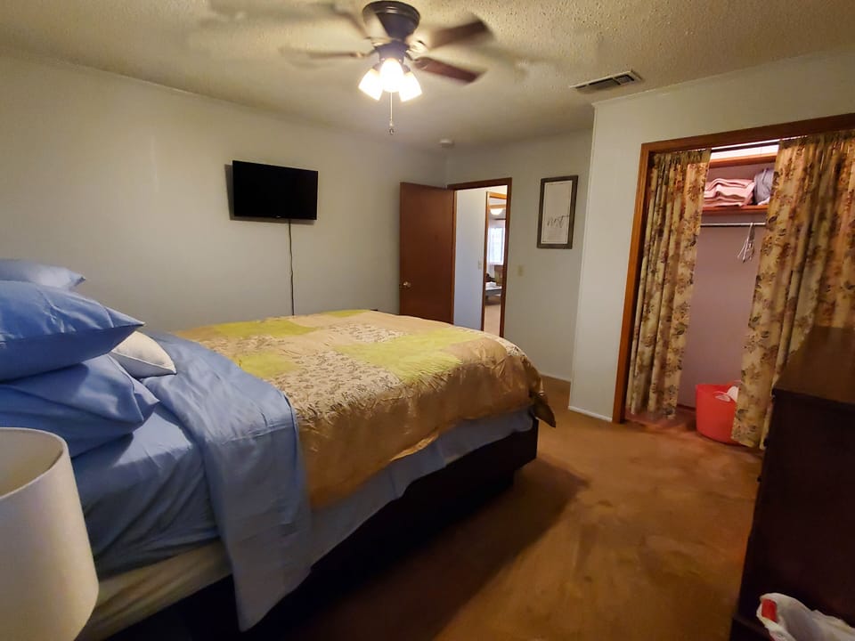 32" swivel mounted Roku TV and Wi-Fi are located in both bedrooms & living room