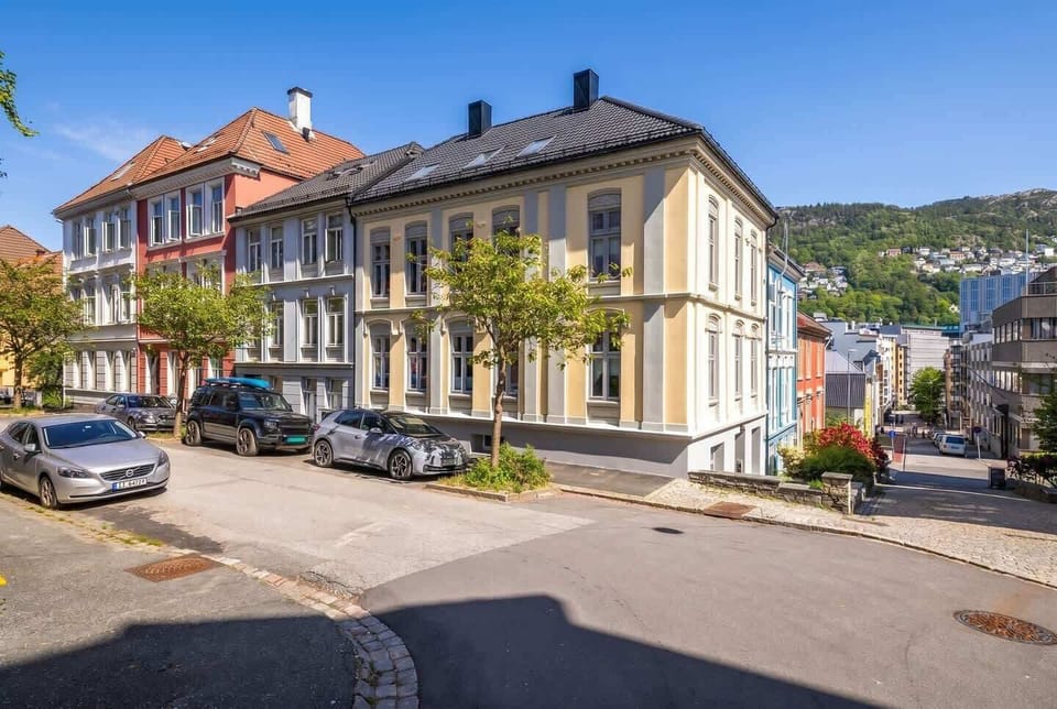 Colorful neighborhood with mountain backdrop