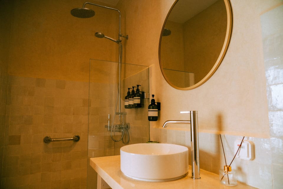 Superior Double Room, Private Bathroom (Vue Mer) | Bathroom | Hair dryer, towels, soap, shampoo