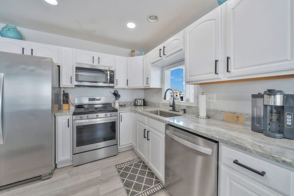 Beachy White Cabinetry and all the comforts of home.