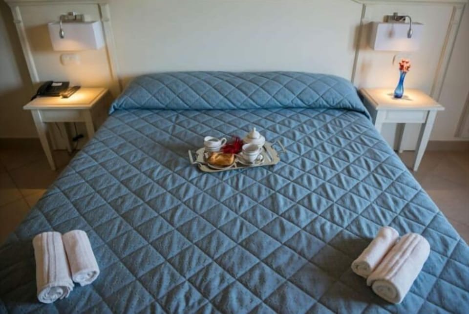 Basic Double Room, Balcony | In-room safe, desk, laptop workspace, blackout drapes