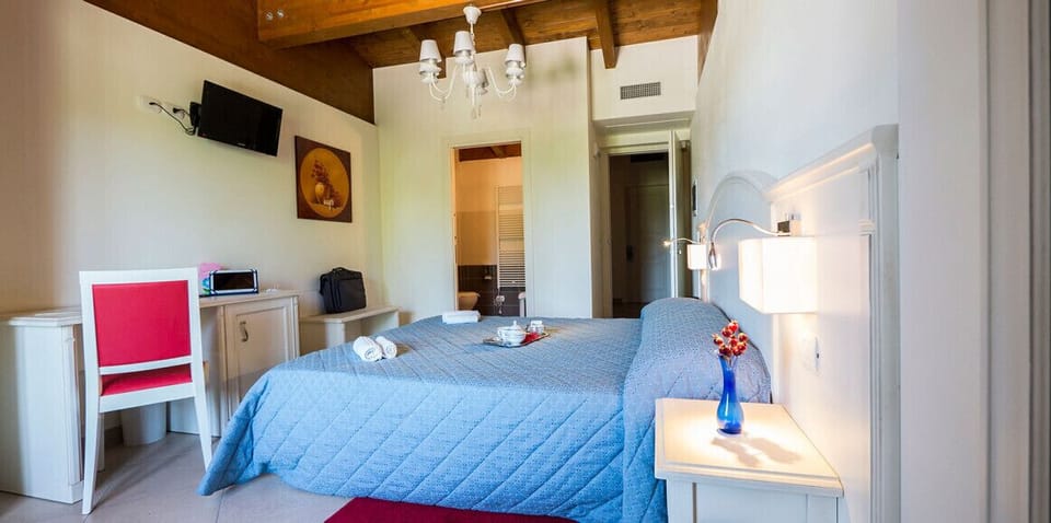 Basic Double Room, Balcony | In-room safe, desk, laptop workspace, blackout drapes