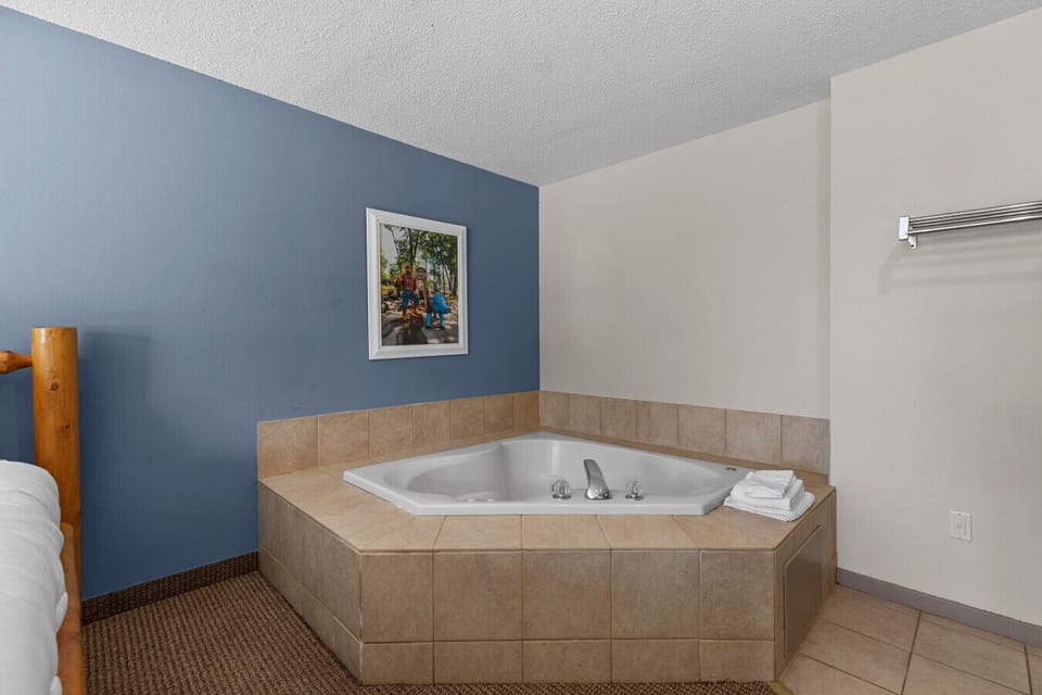Relax and unwind in the in-room whirlpool tub—your own private retreat