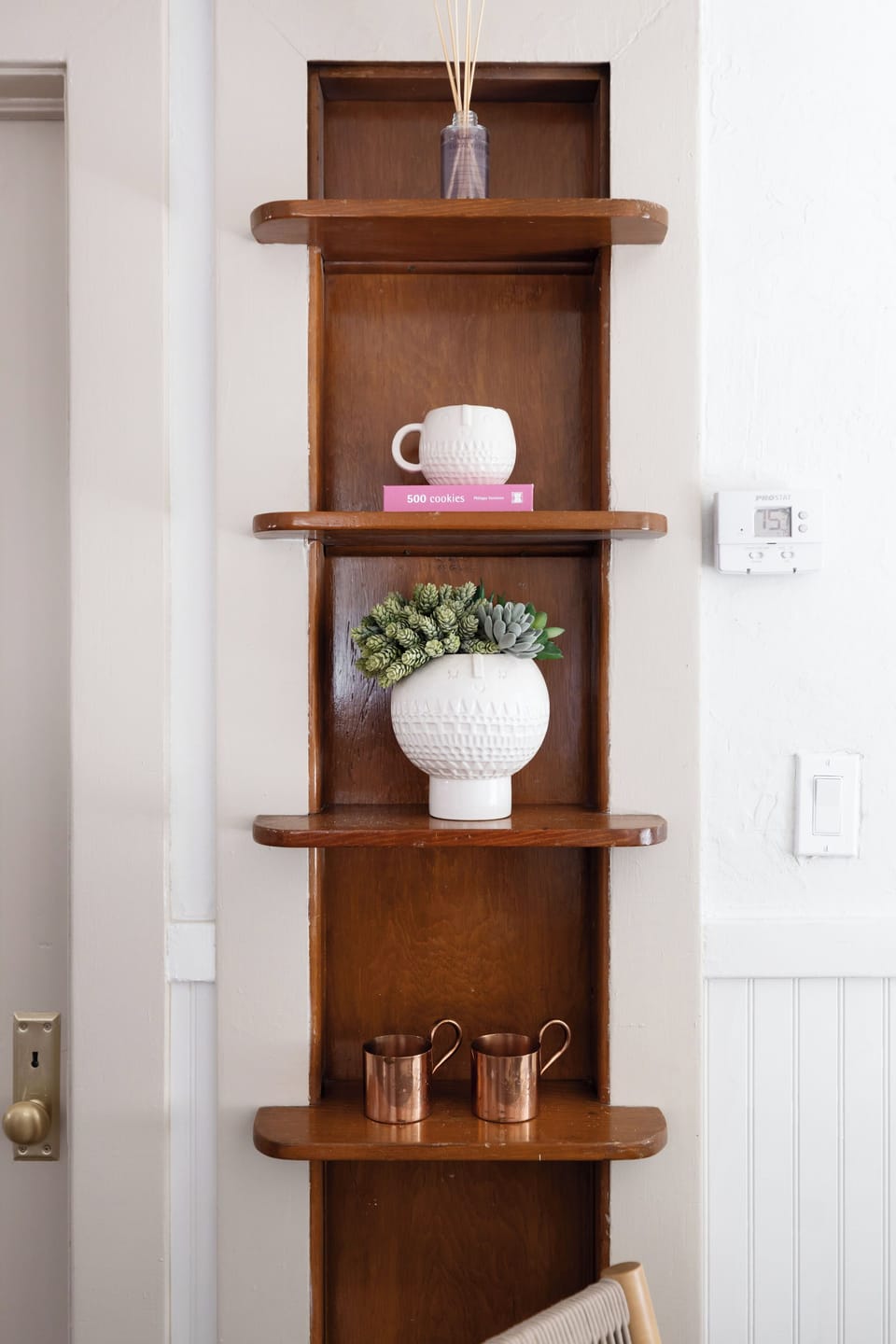 historic details, and curated accessories make this bungalow feel just like home