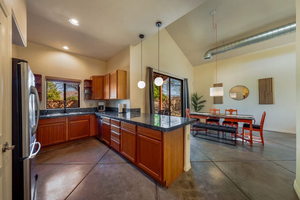 Well-equipped kitchen with stainless steel appliances and plenty of storage