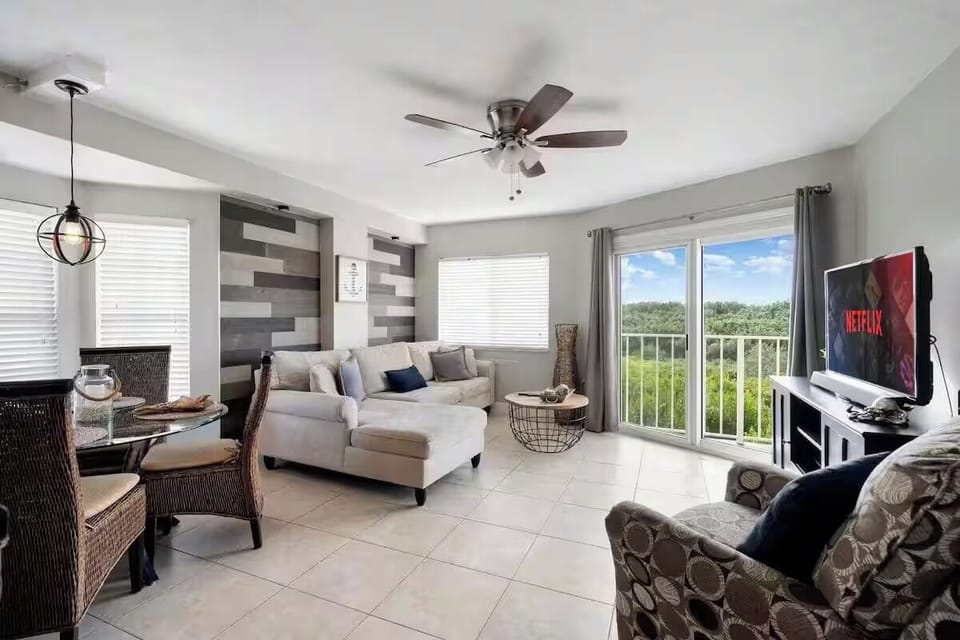 [Living area] Queen sofa bed & 55" Smart TV