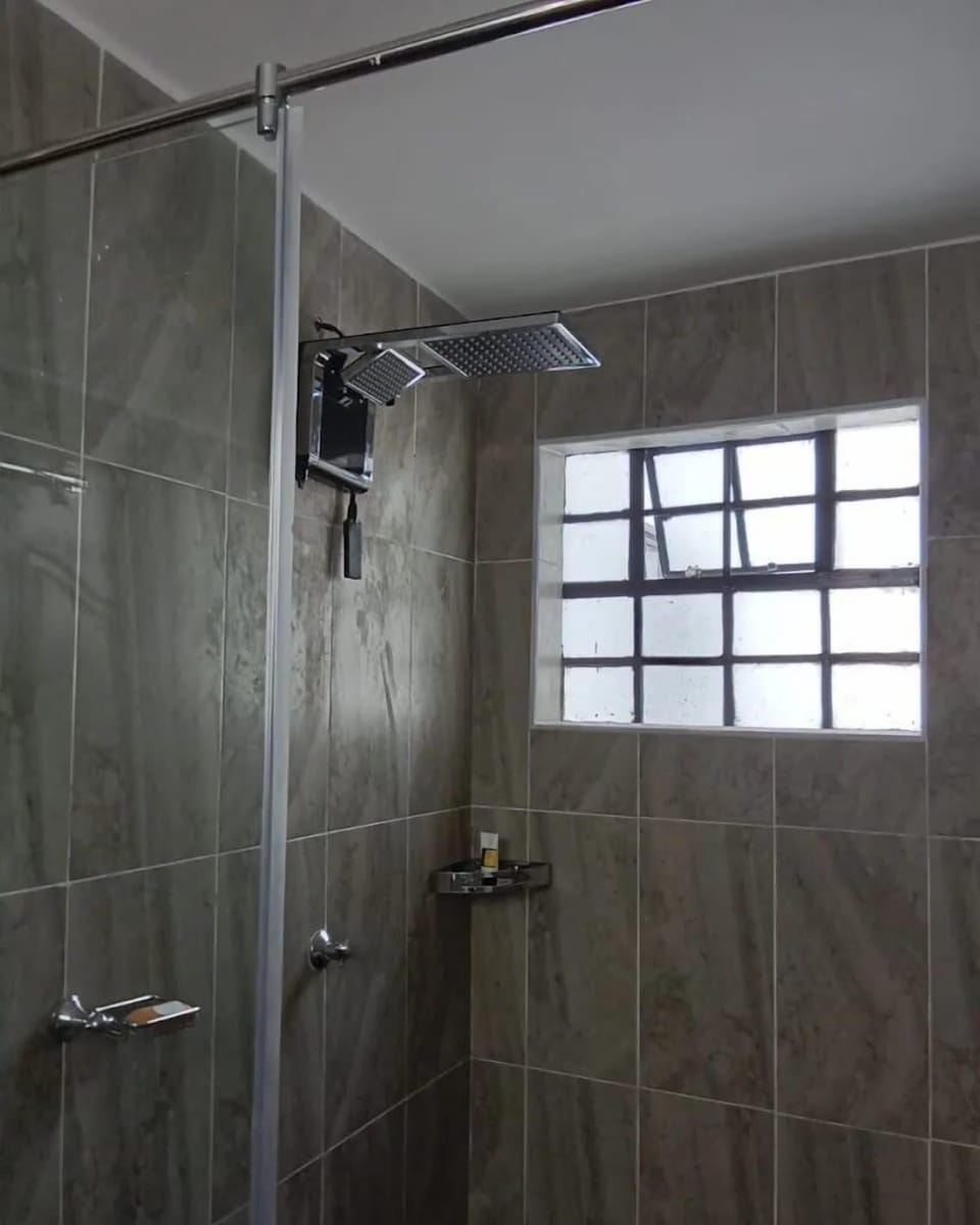 Deluxe Double Room, Garden View | Bathroom | Shower, free toiletries, slippers, towels