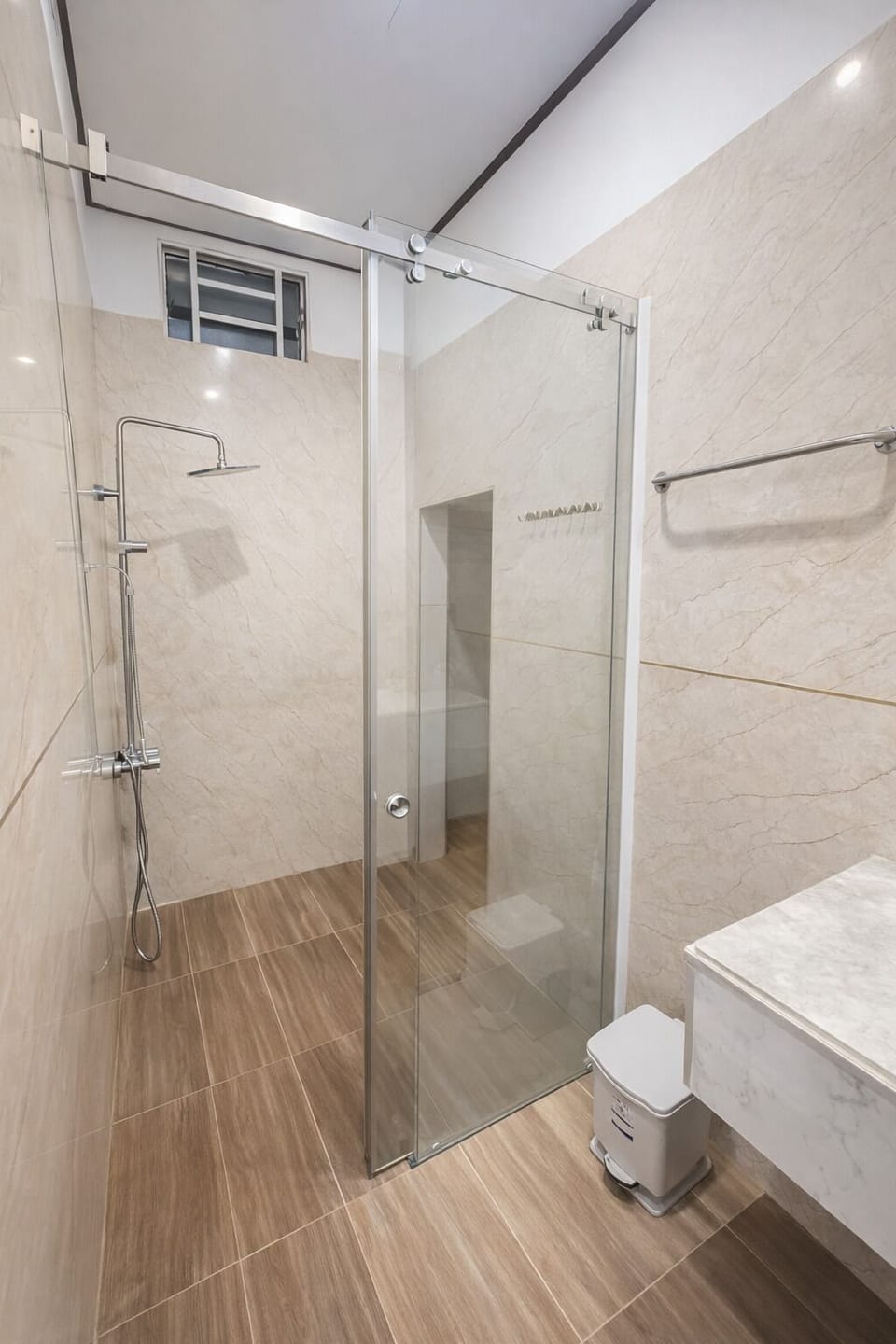 Deluxe Quadruple Room | Bathroom | Shower, rainfall showerhead, designer toiletries, slippers