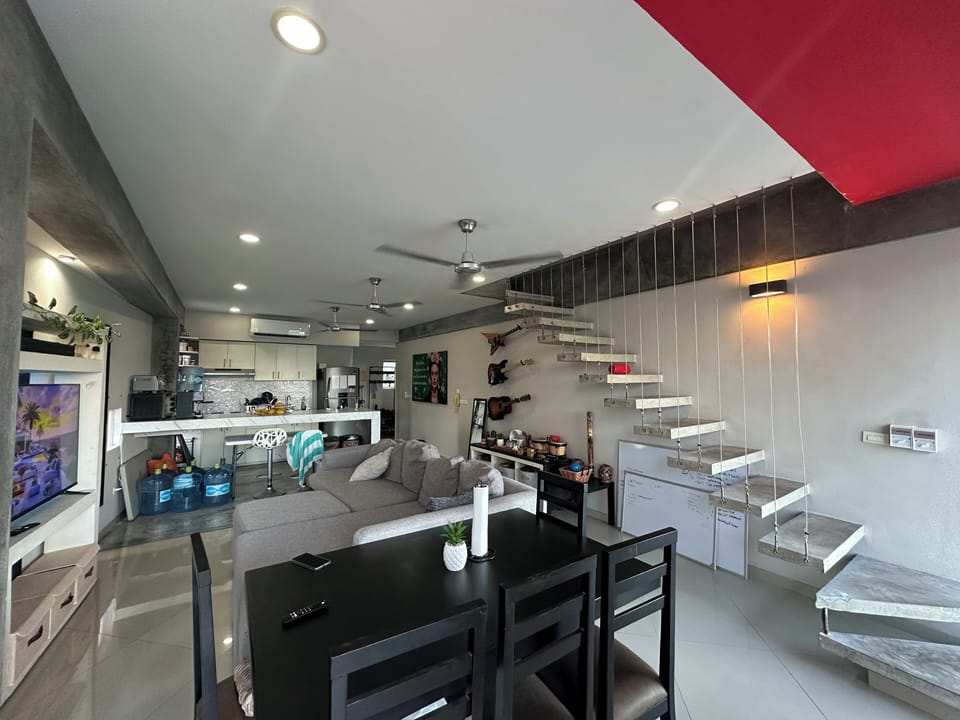 Superior Penthouse, Balcony, City View | Living area | Flat-screen TV, computer monitors