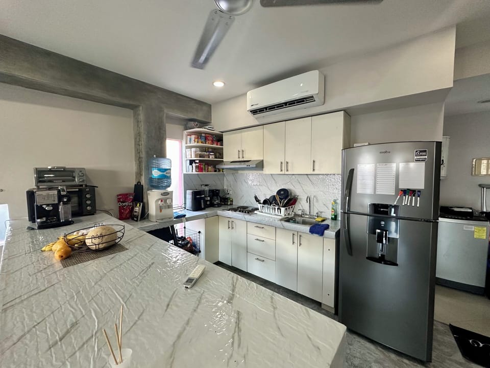 Superior Penthouse, Balcony, City View | Private kitchen | Full-size fridge, microwave, oven, stovetop