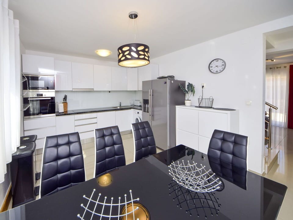 Furniture, Interior Design, Flooring, Ceiling, Floor, Light Fixture, Room, Lighting, Home, Table