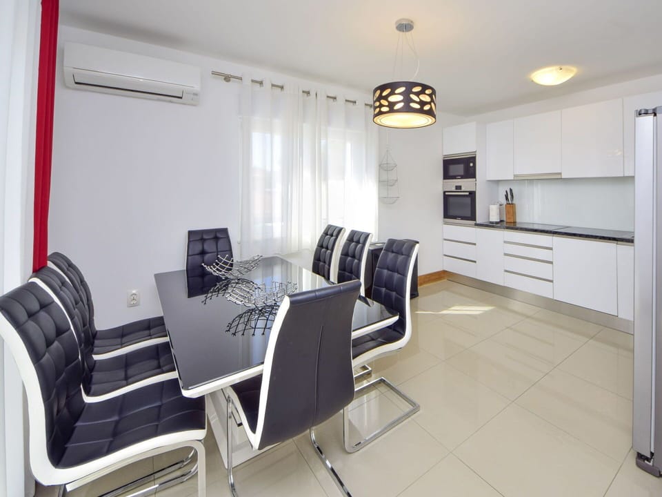 Furniture, Interior Design, Flooring, Floor, Table, Ceiling, Wood, Room, Chair, Lighting