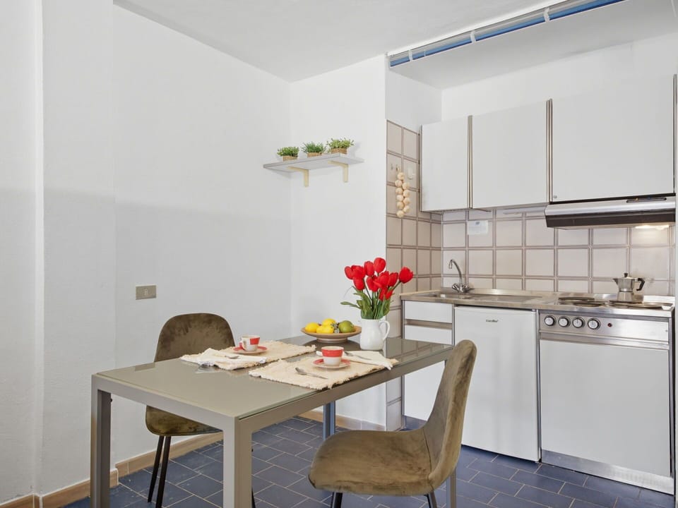 Furniture, Interior Design, Flooring, Wood, Floor, Kitchen, Room, Ceiling, Kitchen Appliance, Lighting