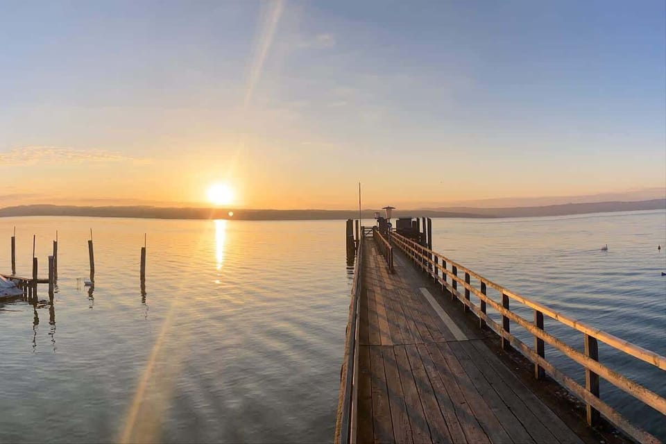 Hier ist einer von vielen wunderbaren Sonnenaufgängen am Dampfersteg in Utting