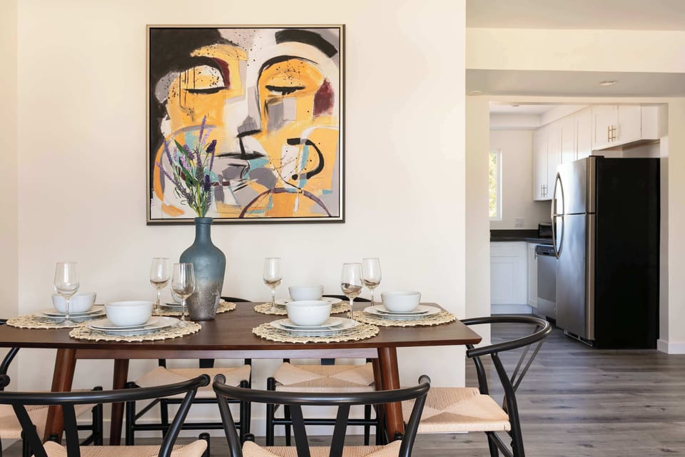 "Gather around our elegant dining table."
