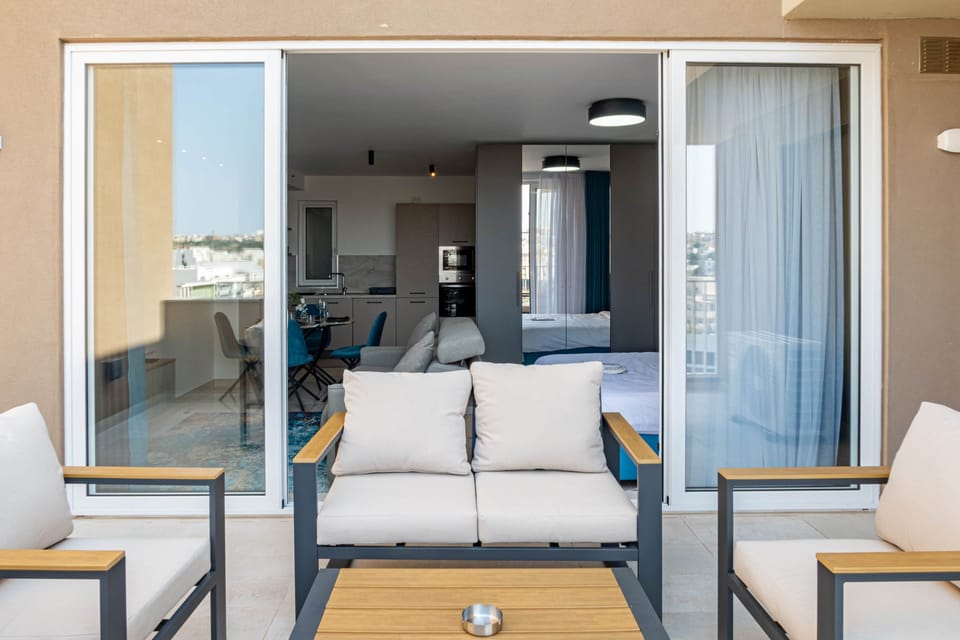 Enjoy the sunny terrace with city views