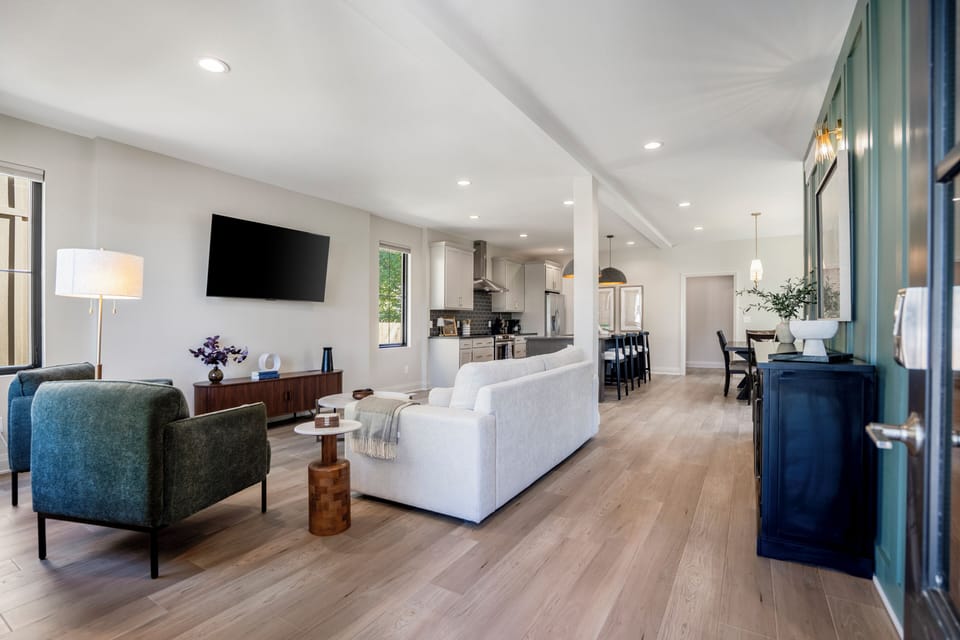 Comfortable living room area with a cozy couch and chairs—perfect for relaxing.