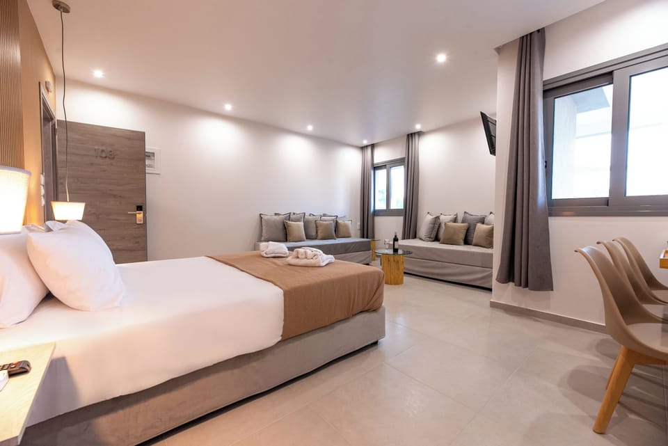 Deluxe Quadruple Room, Courtyard View | In-room safe, desk, soundproofing, free WiFi