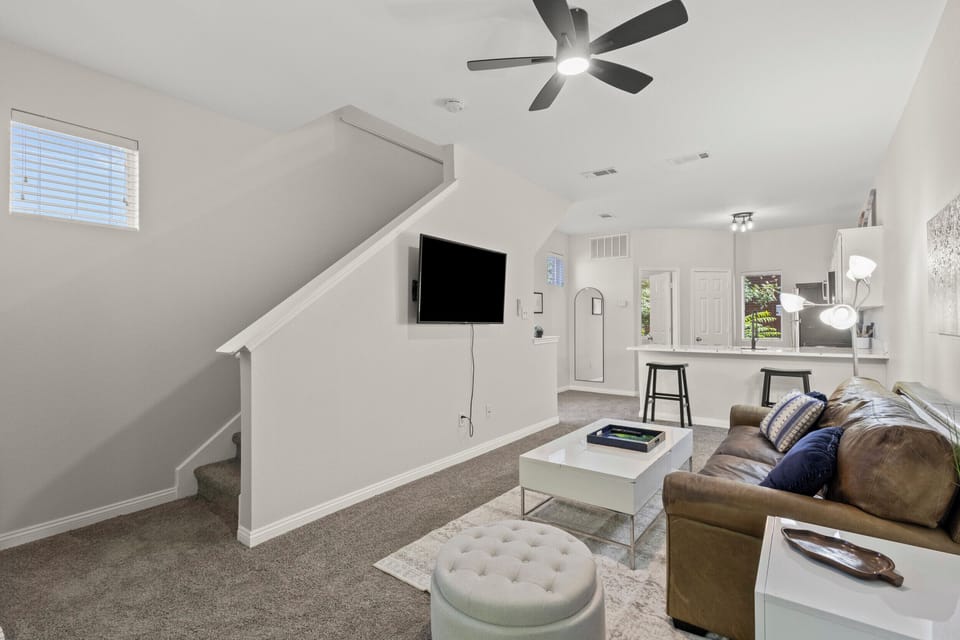 Open floor living space and kitchen.
