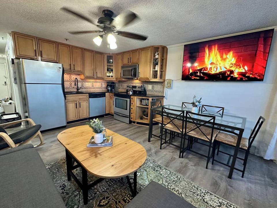 The living room table extends out for meals while on the couch if desired!