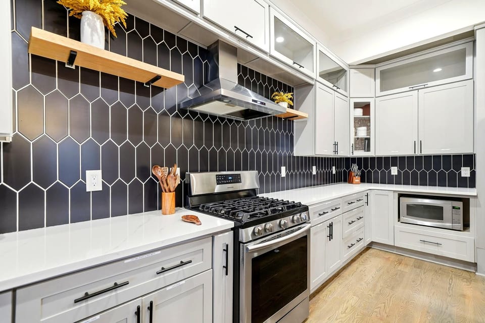 Chef's kitchen full amenities, modern appliances, and an open layout