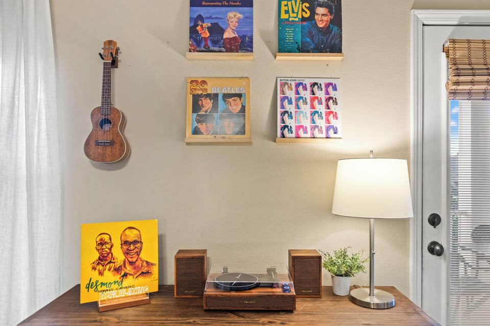 Turn up the good vibes — spin vintage vinyl or strum a tune in this retro-inspired chill space.