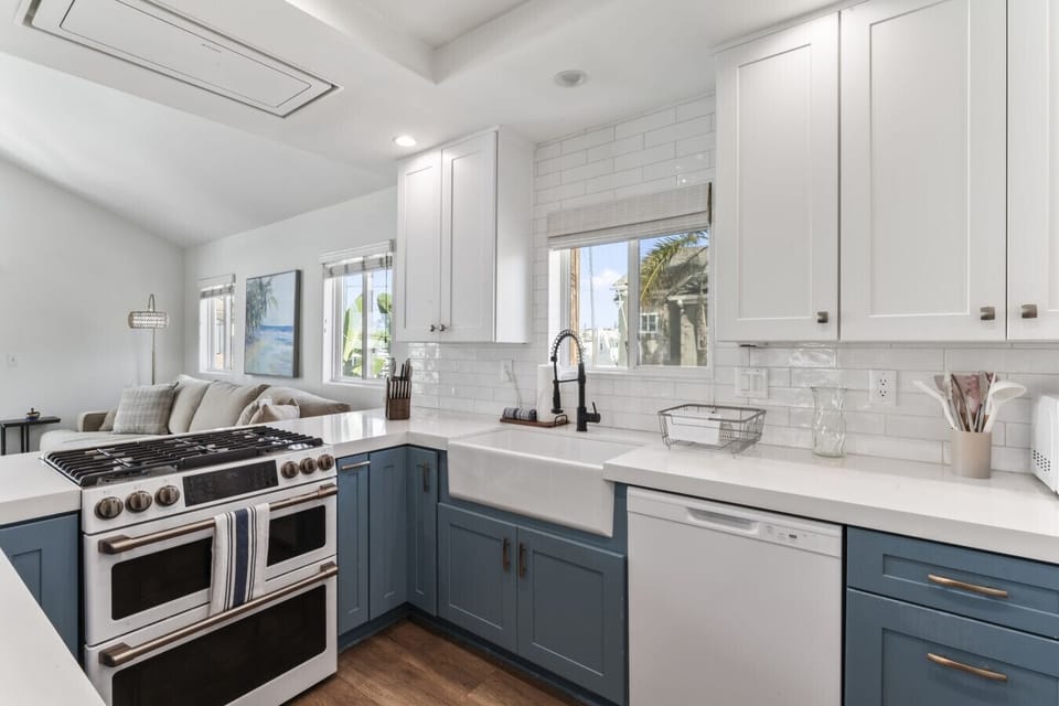 Fully equipped kitchen with modern appliances and generous prep space.