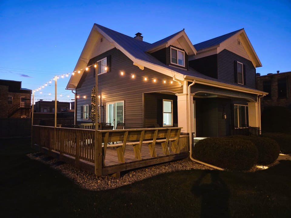 Newly updated deck with outdoor lighting and built-in seating