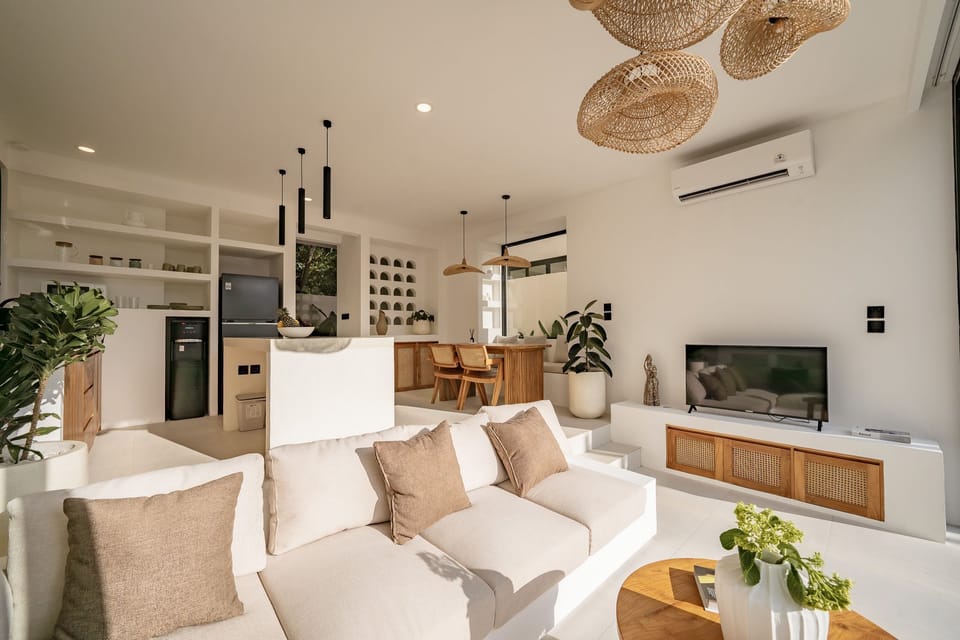 Deluxe Villa, 1 King Bed, Pool View | Living room | 43-inch TV with cable channels