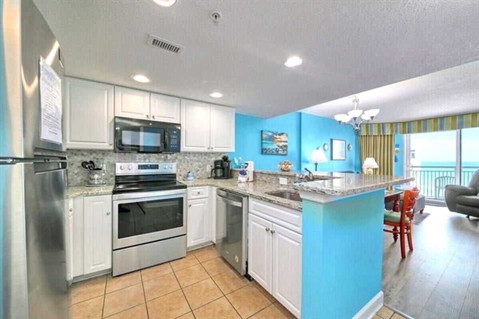 Kitchen with Stainless Stainless Steel Full Size Appliances