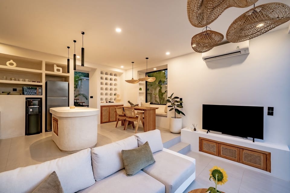 Luxury Villa, 1 King Bed, Pool View | Living room | 55-inch TV with cable channels