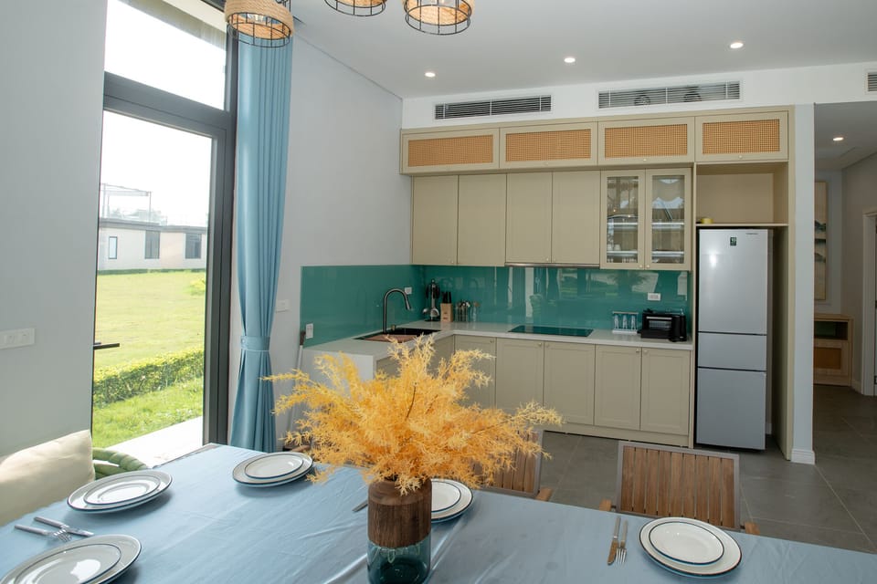 Deluxe Villa, 2 Bedrooms, Ocean View, Beachfront | Private kitchen | Fridge, microwave, oven, cookware/dishes/utensils