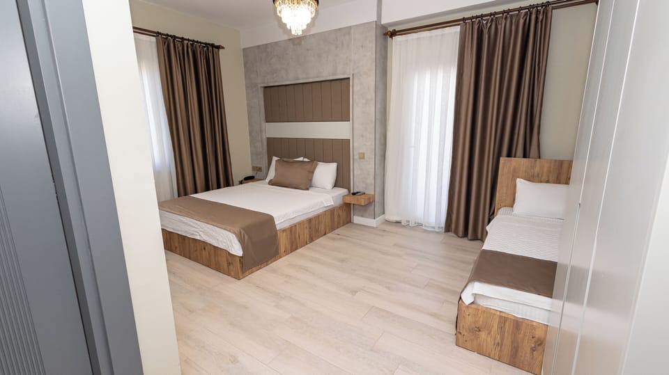 Standard Triple Room, Balcony | Iron/ironing board, free WiFi