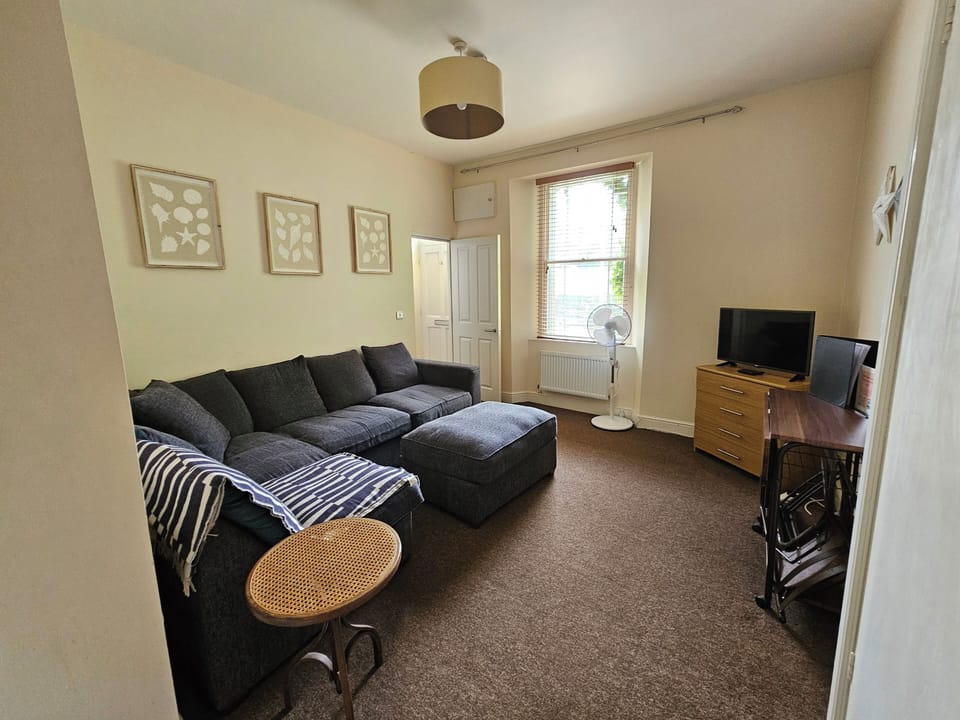 Standard Apartment | Living area | 42-inch LCD TV with satellite channels