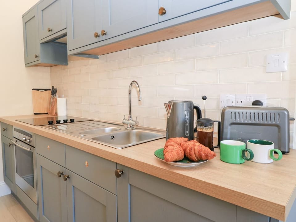 Fridge, toaster, cookware/dishes/utensils