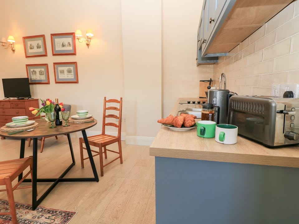 Fridge, toaster, cookware/dishes/utensils