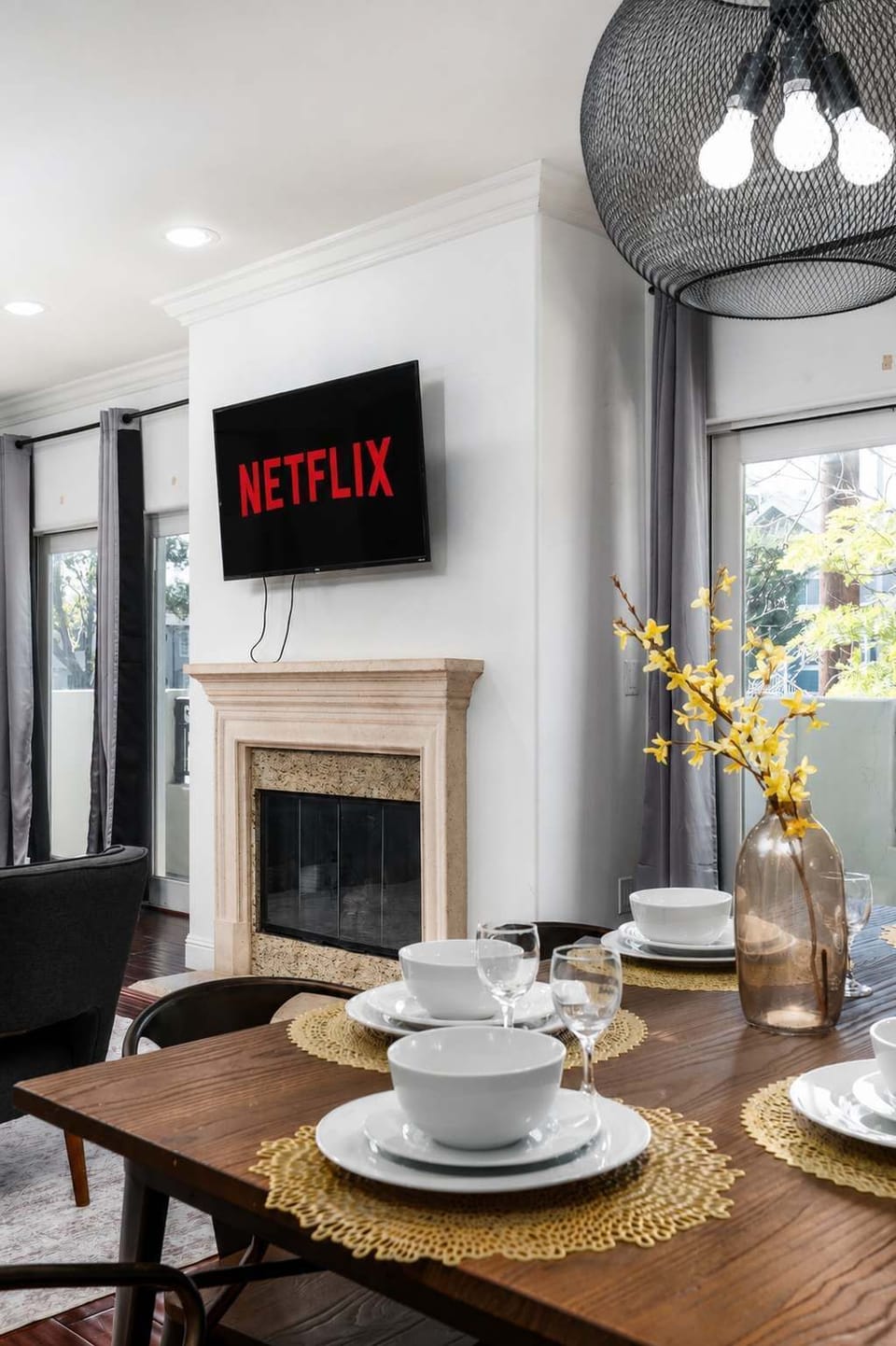 Inviting living space with fireplace and TV