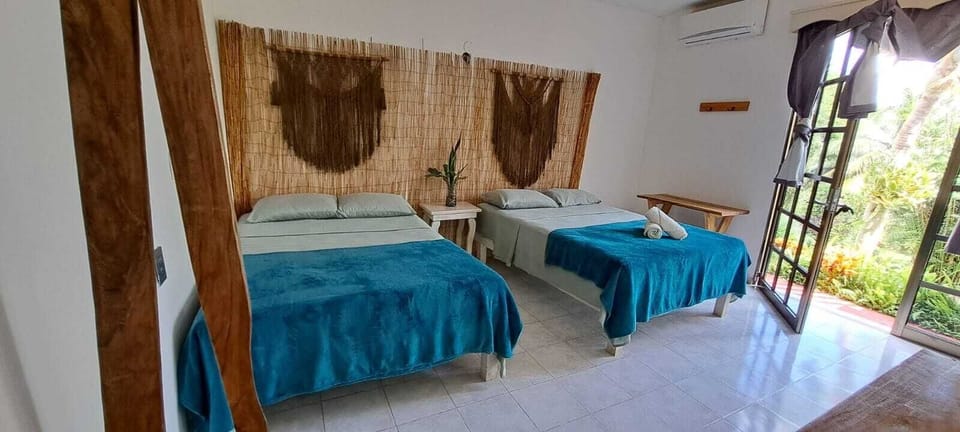 Family Double Room, Balcony, Lagoon View | Free WiFi, bed sheets