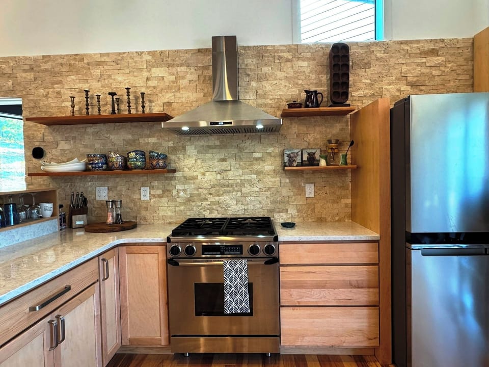 Chef’s kitchen at the heart of the Great Room.