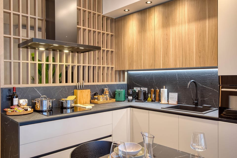 Cook like a pro in a kitchen designed for creativity, including high-end appliances & utensils.